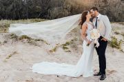 wedding hair down style with veil at beach